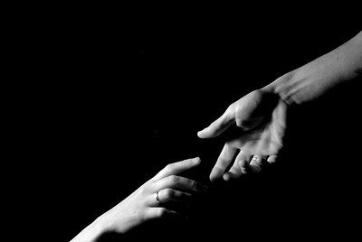 reaching hands